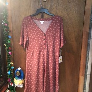 Cute dress brand new with tags.           #104